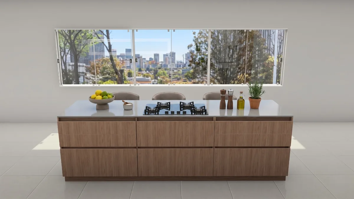 Isla de cocina en macadamia con cooktop a gas frente a ventana panorámica con vista a Medellín